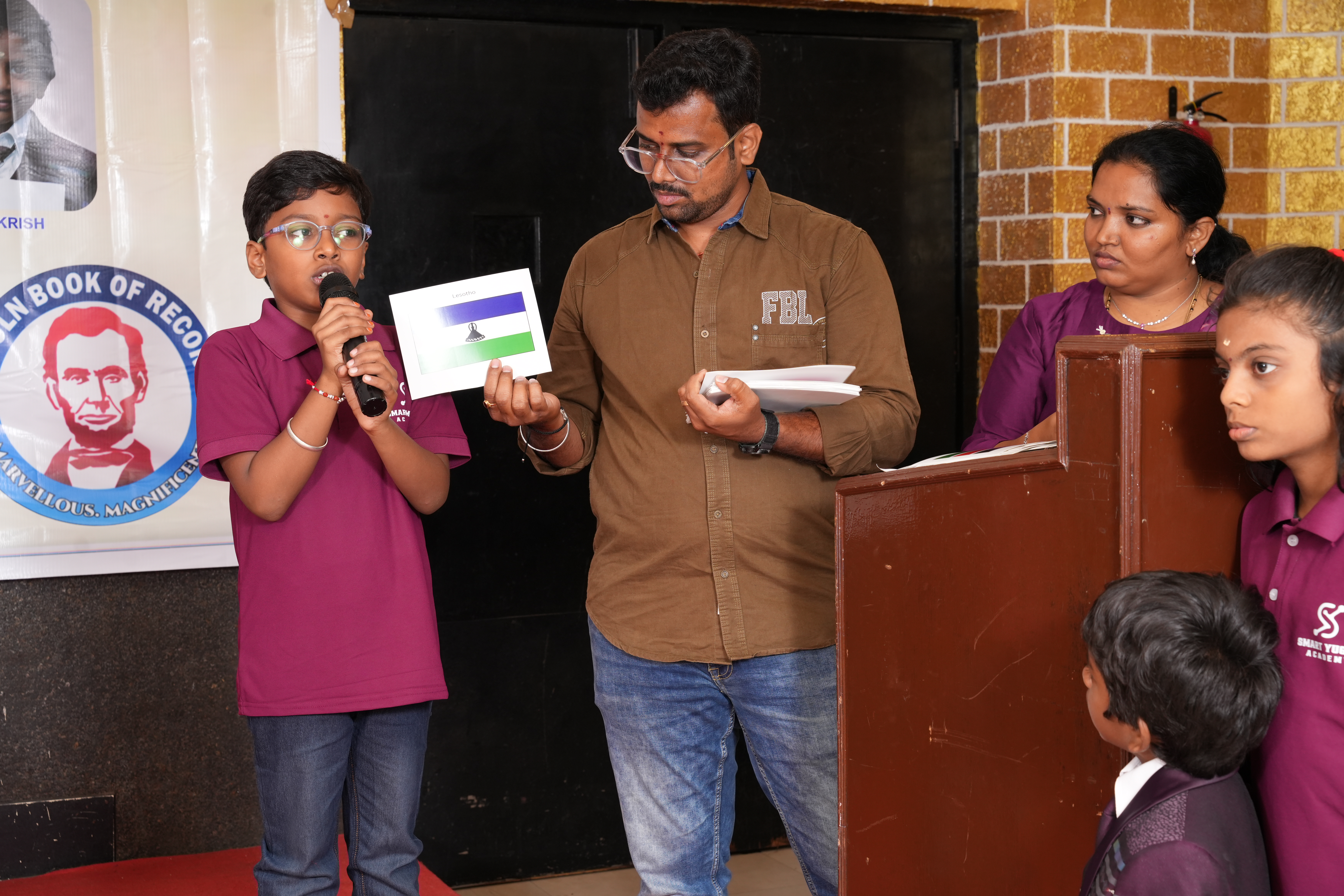 World youngest kid to have an amazing memory prodigy to create a world record by reciting 195 country names along with the capital, national symbol and official language by identifying 195 Country Flags in least time.